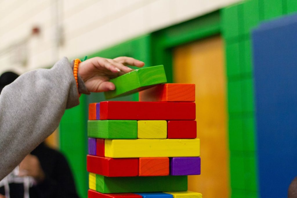 person-piling-blocks-kucglbxjh-o Colorful Stack
